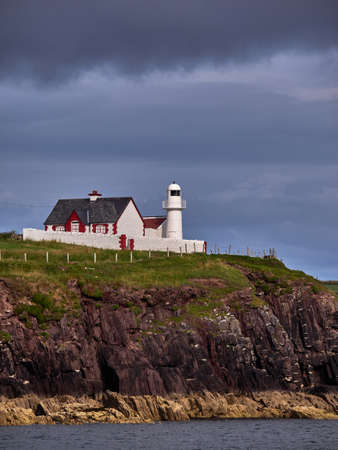 This small lighthouse is one of the landmarks of Dingle harbourの写真素材