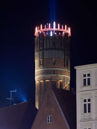 The watertower in Lueneburg, Germany, is illuminated by electric candles during Adventのeditorial素材