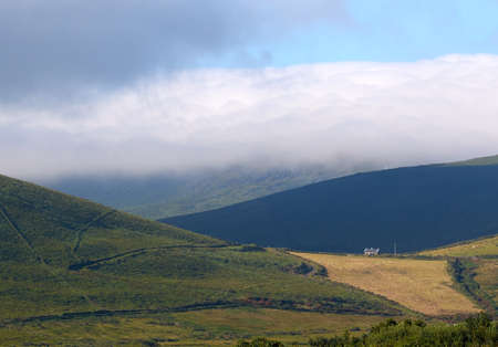 Lonely house in Dingle, Ireland, on a sunny morningの写真素材