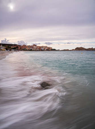 Waves bathing a rock at l'ÃŽle Rousse, Corsica