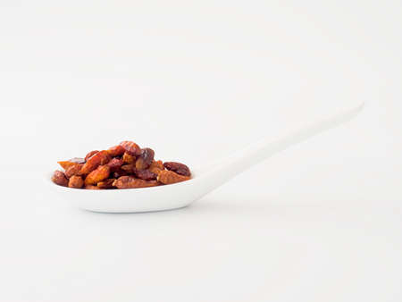 spicy spices in white spoons on white backgroundの写真素材