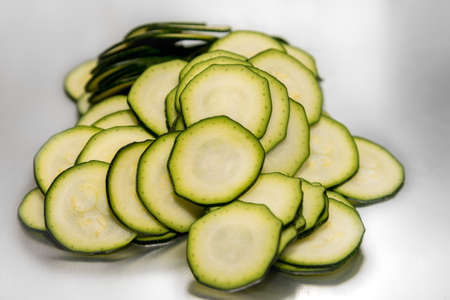 courgette, zucchini sliced in very thin rounds.selective focus