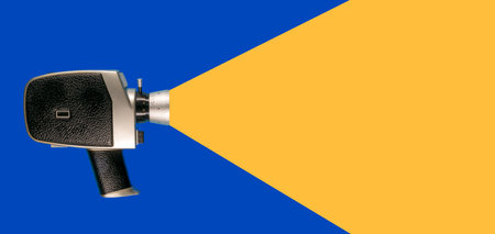 old style movie camera that simulates shooting with abstract yellow light cone that starts from the...