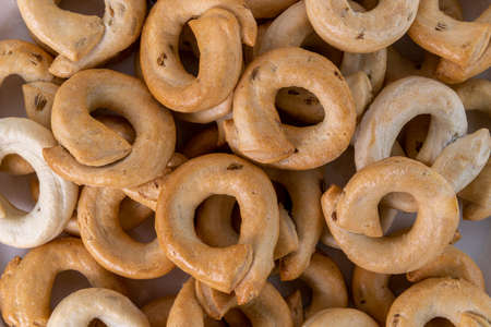 Taralli tarallini or tarallucci with fennel seeds from Puglia, Italy, close up in top viewの写真素材