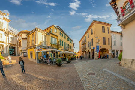Barolo, Cuneo, Italy - November 05, 2021: Piazza Municipio with the town hall on the right and the Osteria on the leftのeditorial素材