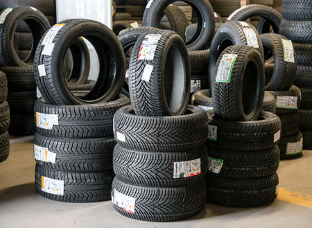 Turin, Italy - November 10, 2021: New Pirelli and Kleber winter tires on display at the tire dealer for the seasonal changeのeditorial素材