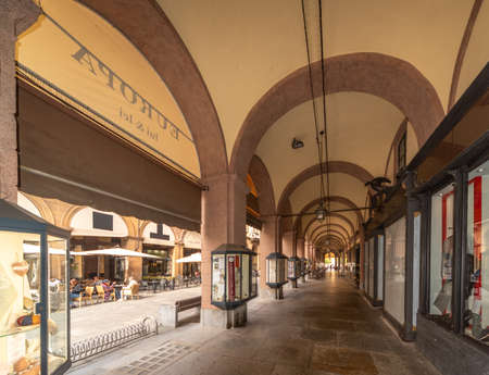 Saluzzo, Cuneo, Italy - October 19, 2021: The arcades of via Silvio Pellico, central pedestrian streetのeditorial素材