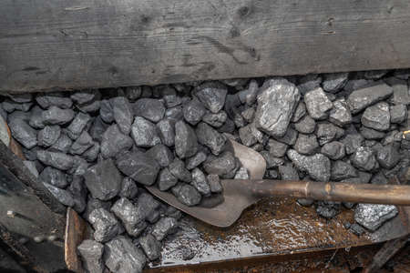 A coal shovel in an old steam train locomotives