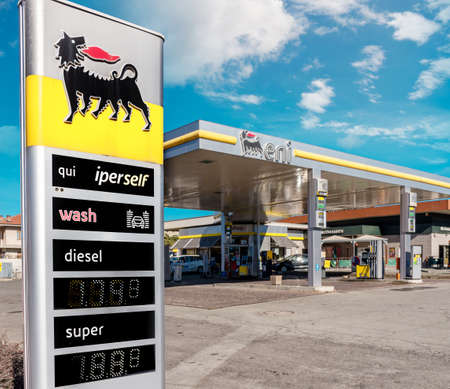 Fossano, Italy - February 22, 2022: Eni logo sign with fuel price display, Eni Spa is an Italian oil...