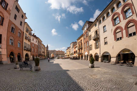 Savigliano, Cuneo, Piedmont, Italy - May 04, 2022: Piazza Santarosa, main square with historic buildings of medieval origin, fish eye visionのeditorial素材