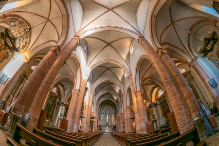 Carmagnola, Turin, Italy - November 05, 2022: Interior view of the Collegiate Church of Saints Peter and Paul in neo-Gothic styleのeditorial素材
