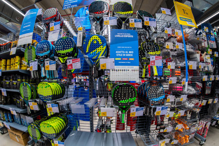 Cuneo, Italy - November 22; 2022: paddle tennis racket on sale on shelf in Italian Decathlon store, Decathlon is a french sporting goods retailer famous the world, fish eye viewのeditorial素材