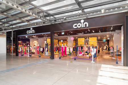 Turin, Italy - May 2023, 22: Coin store entrance in Lingotto shopping center. Coin is Italian chain of department stores dedicated to the world of clothing, home decorations, accessories and beauty.のeditorial素材
