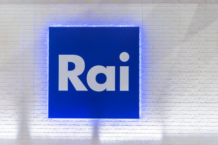 Turin, Italy - May 22, 2023: Logo of RAI Radio Televisione Italiana on sign on white brick wall. RAI is broadcasting company of Italyのeditorial素材