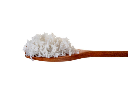 White boiled rice on wooden spoon isolated on white with clipping path includedの写真素材