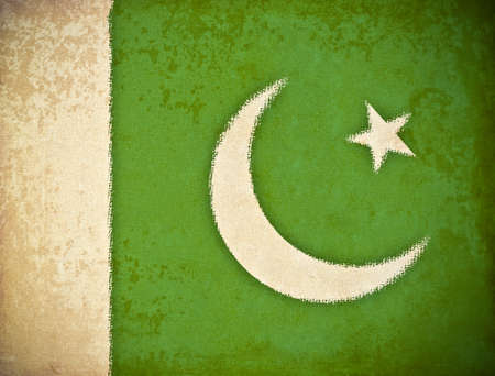 old grunge paper with Pakistan flag backgroundの写真素材