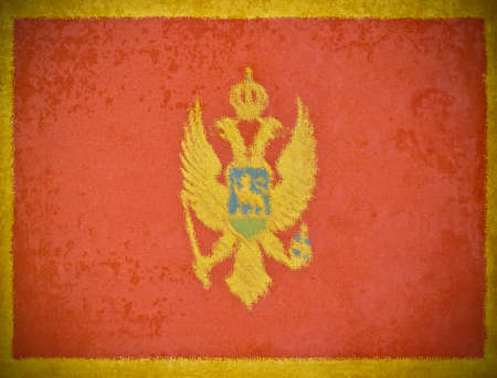 old grunge paper with Montenegro flag backgroundの写真素材
