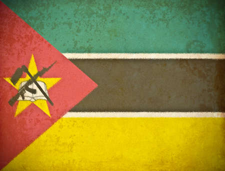 old grunge paper with Mozambique flag backgroundの写真素材