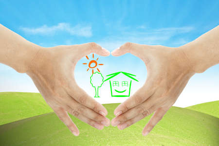 hand and home business make heart shapeの写真素材