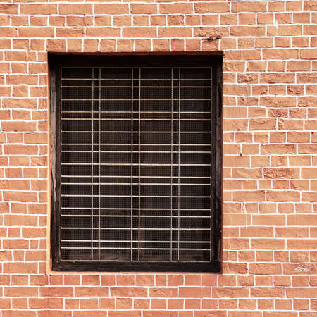 Window and red brick wallの写真素材