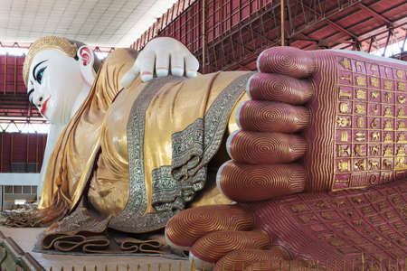 footprint of giant reclining Buddha at Chaukhtatgyi temple in Yangon, Myanmarのeditorial素材