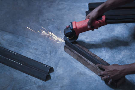 worker cutting steel and sparkの写真素材
