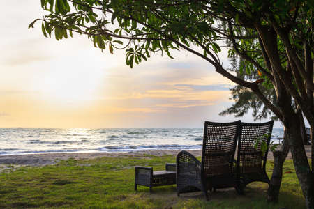Beach chair on sand beach for relaxingの写真素材
