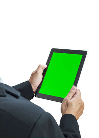 business man holding digital tablet, green screen on white backgroundの写真素材