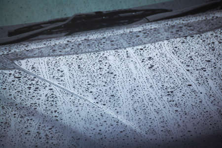 drops of water from rain on the carの写真素材