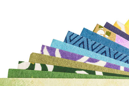 Abstract colorful origami paper pattern texture stacked layer respective, on white backgroundの写真素材