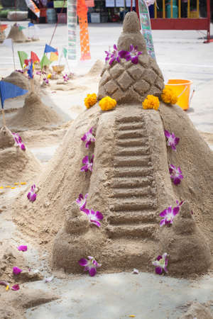 Sand pagoda ceremony, Cultural activities including sand sculpture for Songkran festivalの写真素材
