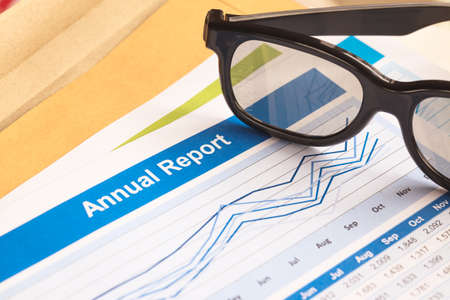 Annual Report letter document and eyeglassの写真素材