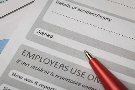 Signature field on document with pen and signed here; document is mock-upの写真素材