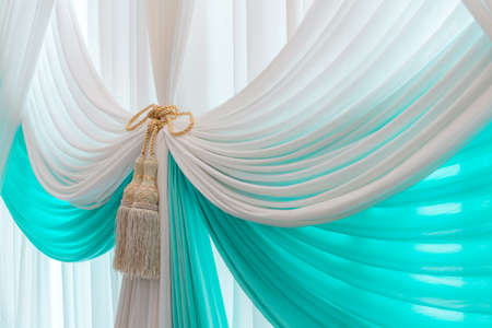 Luxury sweet white and blue curtain and tasselの写真素材