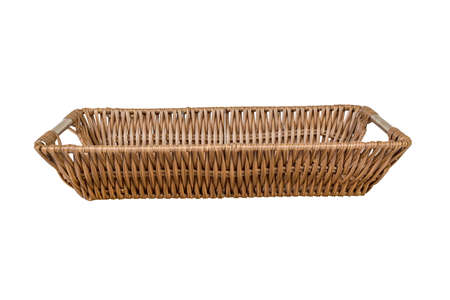 Empty wicker basket isolated on white backgroundの写真素材