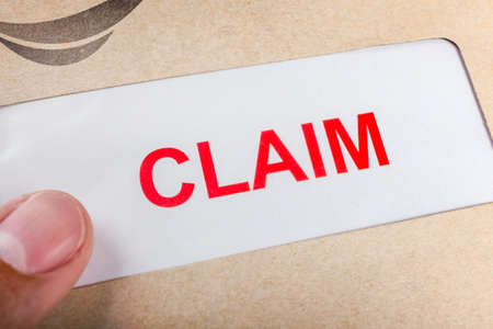 Claim form in brown envelope, can use insurance conceptの写真素材