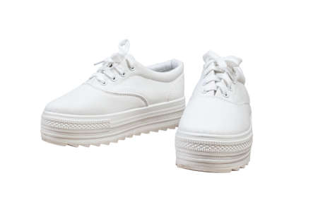 Pair sneakers, white color isolated backgroundの写真素材