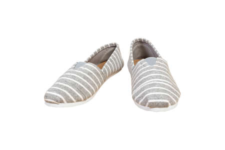Pair sneakers, grey white strip color isolated backgroundの写真素材