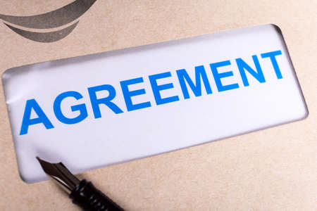 Agreement in brown envelope, can use business contract conceptの写真素材