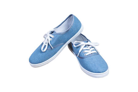 Pair sneakers, blue color isolated backgroundの写真素材