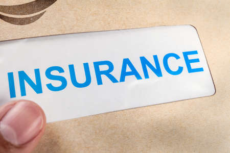 Insurance Claim form in brown envelope, can use insurance conceptの写真素材