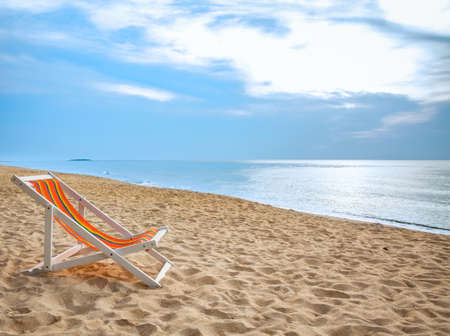 beach chair on tropical white sandの写真素材