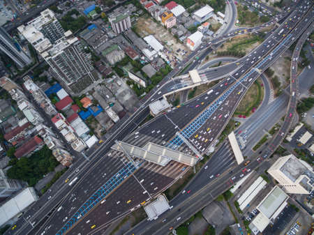 aerial view of traffic junction and transportation road in city, top and birdeyes view shot 90 degreeの写真素材