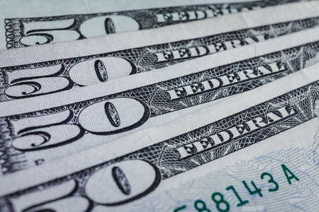 banknotes 50 usd counting stack respectively background, american dollar, financial concept theme, selective focusの写真素材