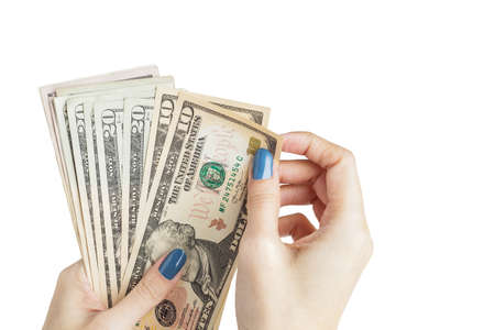Money in the hand, Hand with money, Hand holding Banknotes and counting for give or pay bill, can use as financial or business backgroundの写真素材