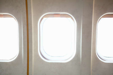 window airplane and empty white window blank isolated on white backgroundの写真素材
