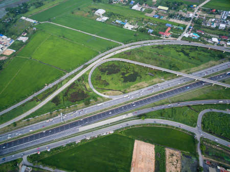 aerial view of traffic junction and transportation road in city, top and birdeyes view shot 90...