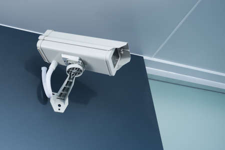 cctv camera security on wall background for safety concept
