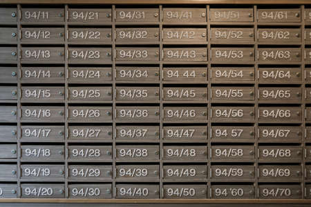Mailboxes wooden with Lock at Entrance, can use as business backgroundの写真素材