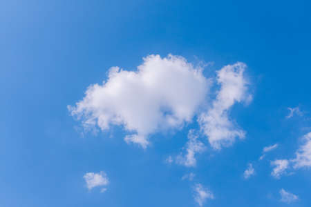 one cloudy sky and blue clear sky clouds backgroundの写真素材